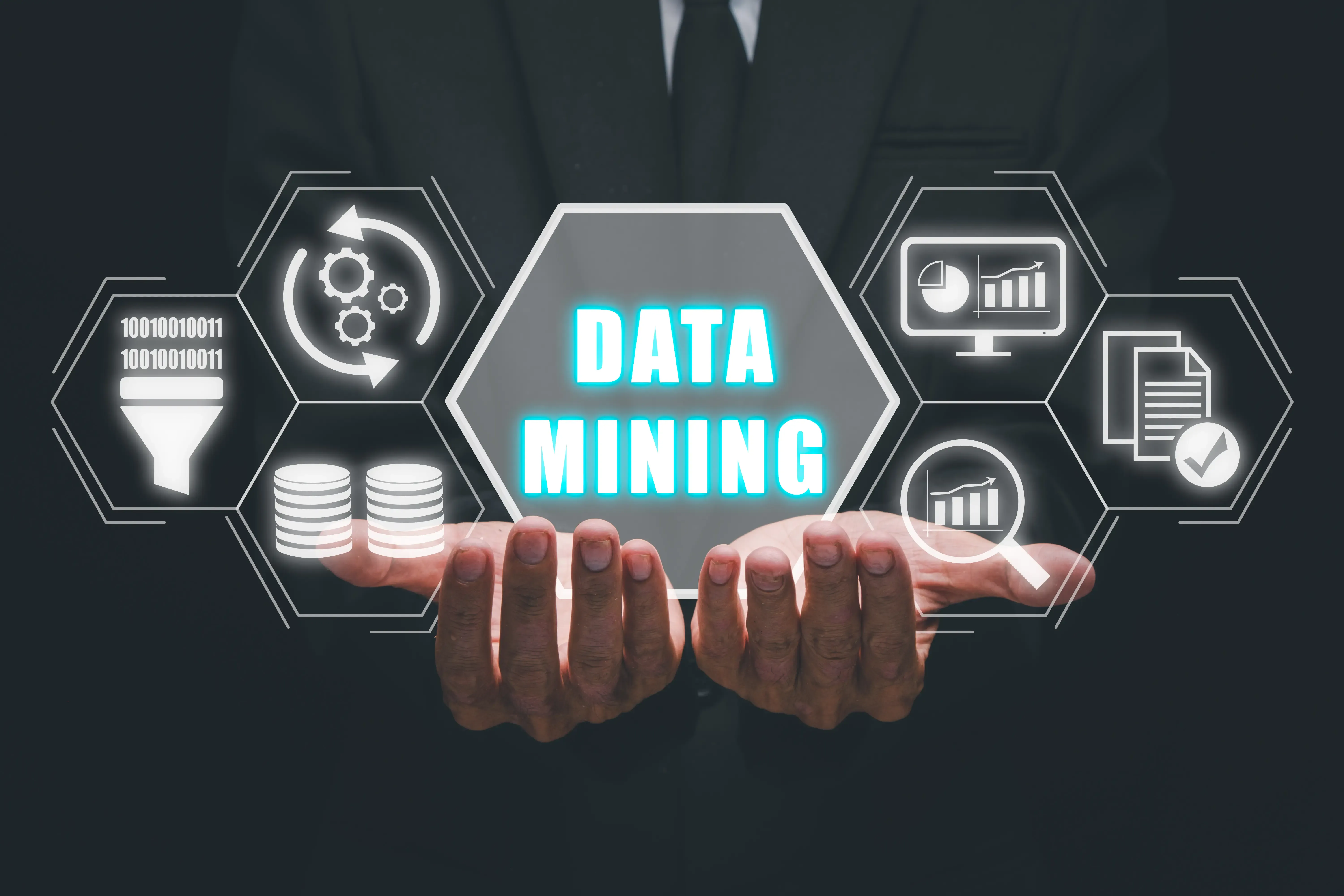 Data mining for business and organization businessman hand holding data mining icon on vr screen internet and networking concept