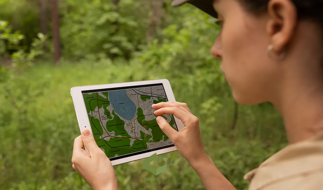 woman monitoring field using tablet